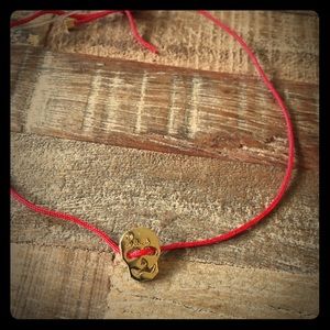 NWT Red String Skull Bracelet